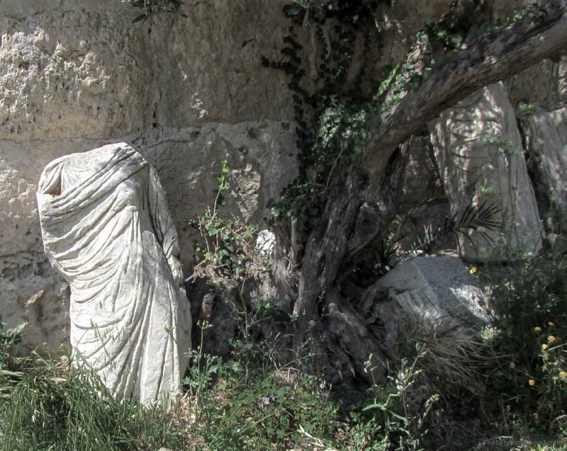 Statue abandoned by the trees Kos Castle Greece